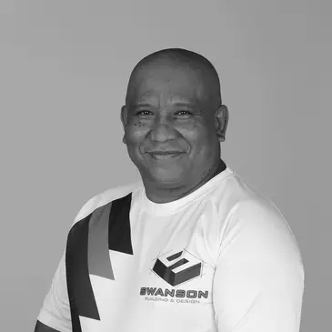 Man smiling in Swanson t-shirt