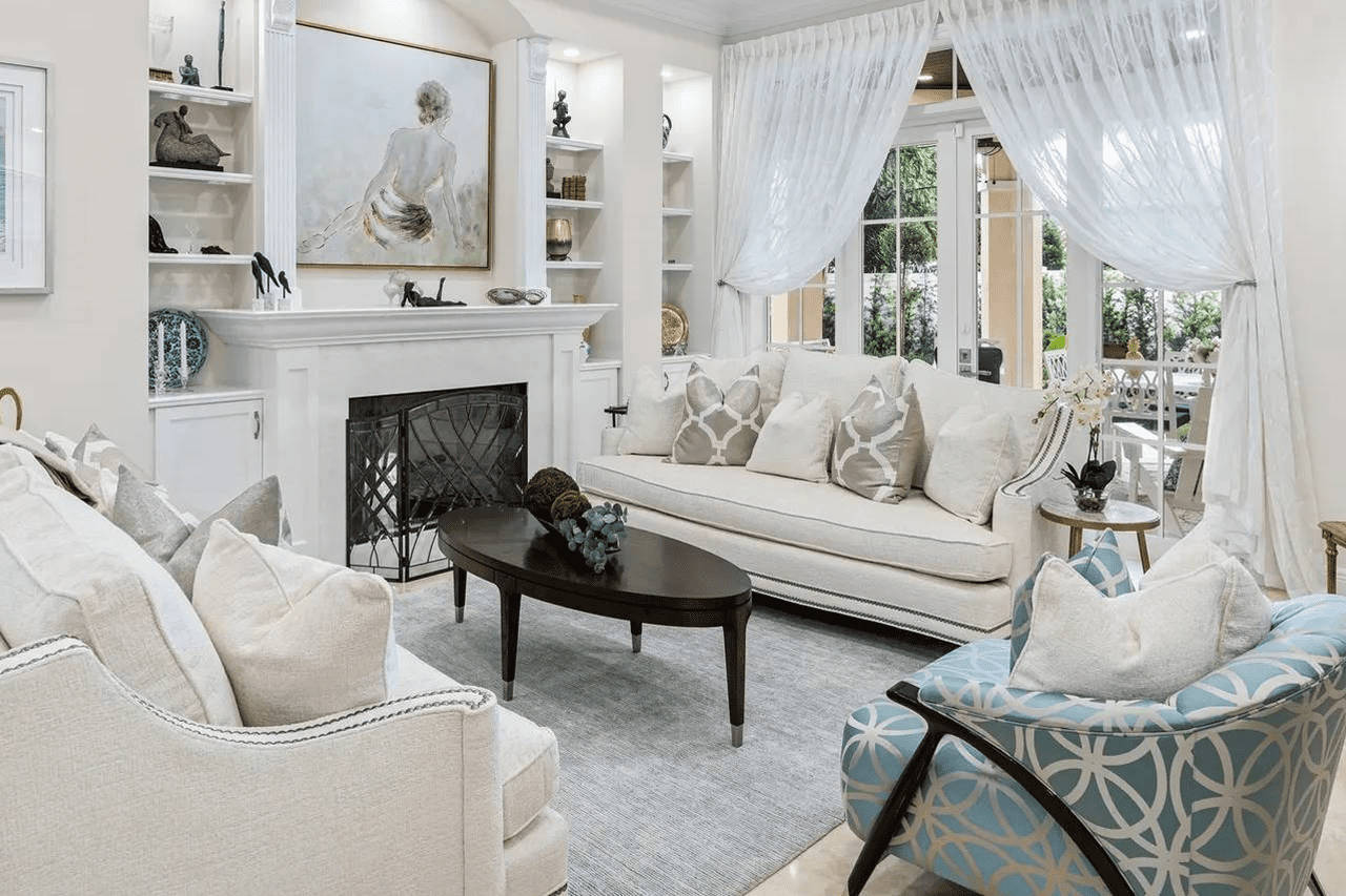 Elegant living room with neutral tones and cozy seating.
