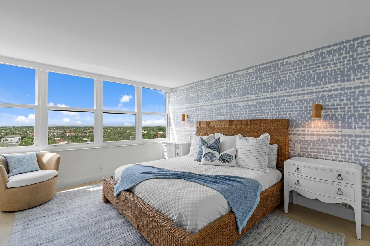 Modern bedroom with large windows
